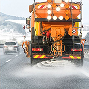Image of truck applying salt/solution