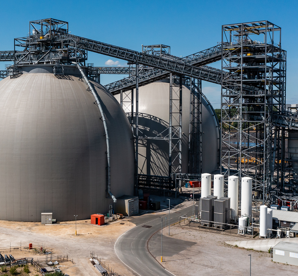 Biofuel storage tanks at a power plant.