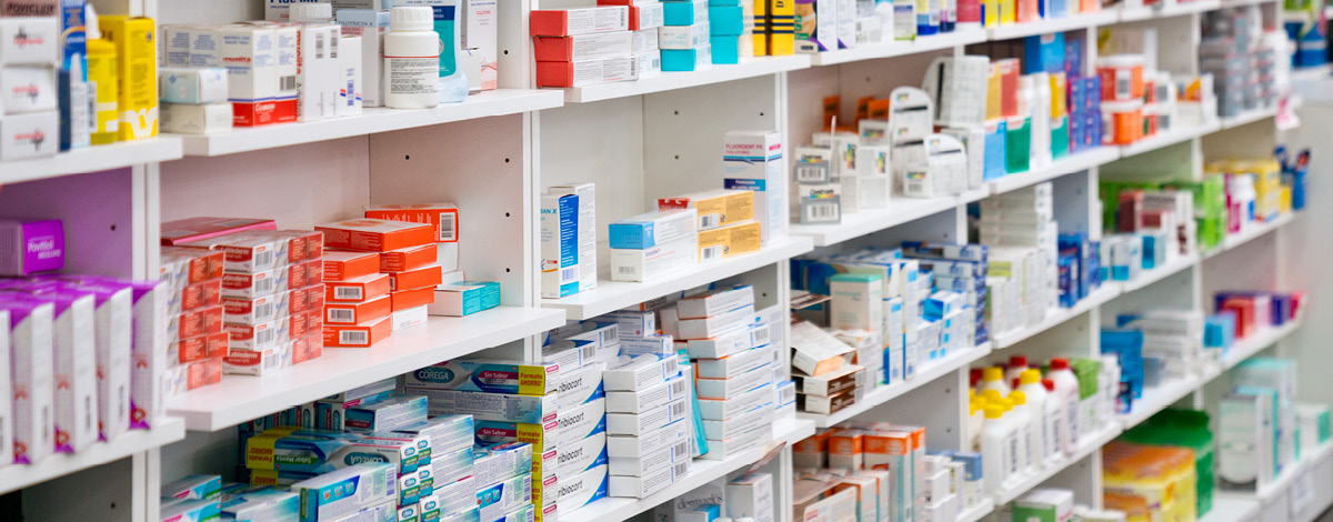 Shelves of medicines in a pharmacy.