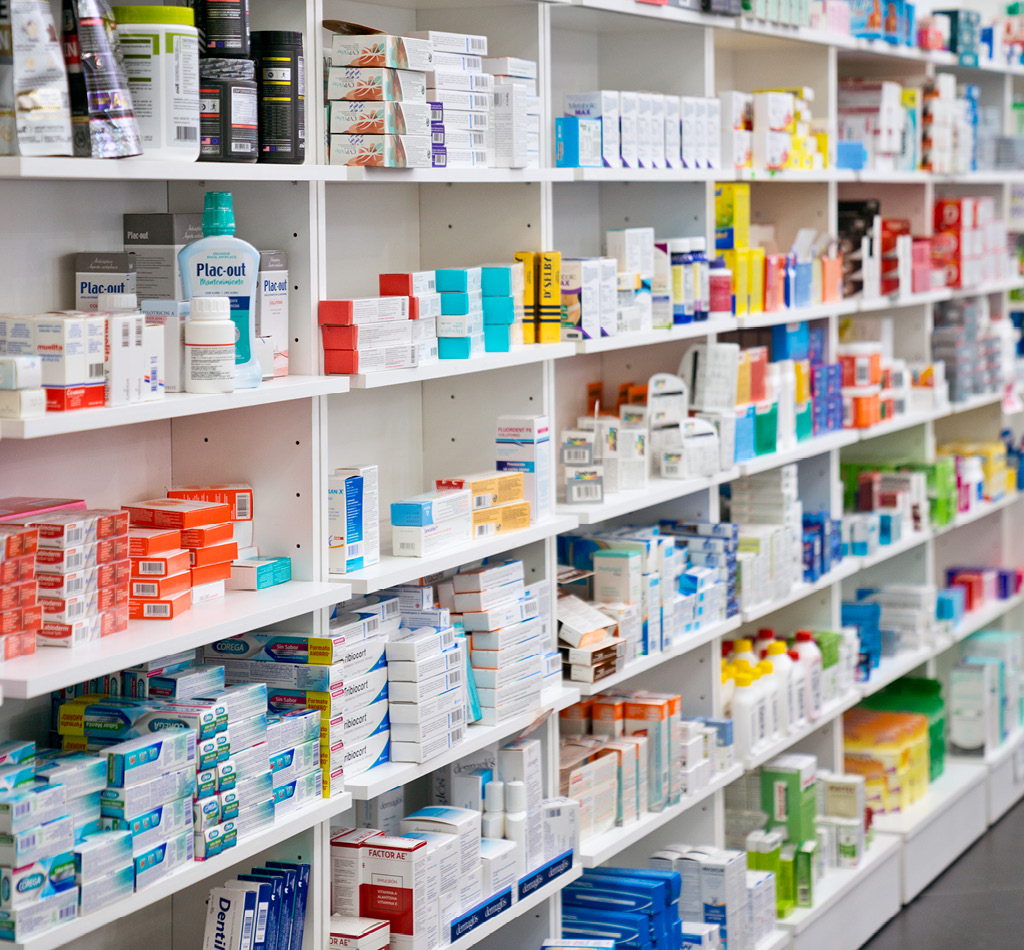 Shelves of medicines in a pharmacy.
