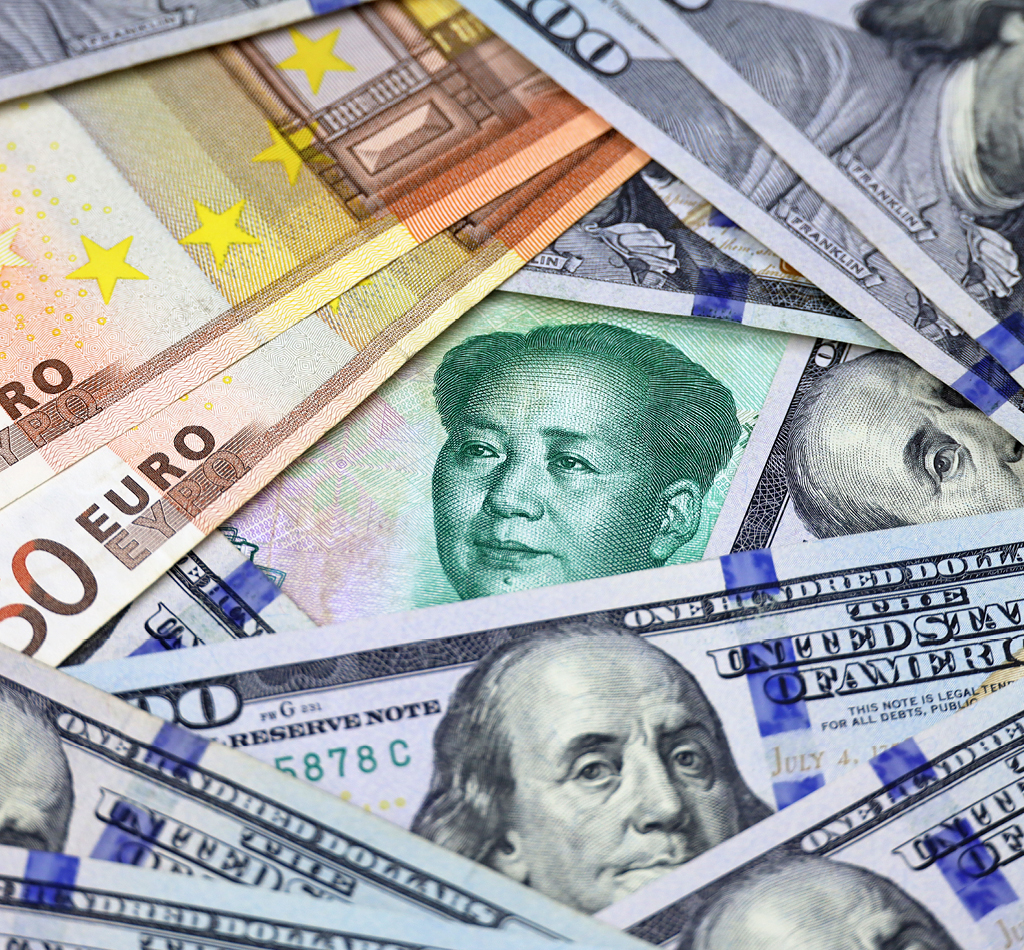 Chinese yuan, US dollars and Euro banknotes.