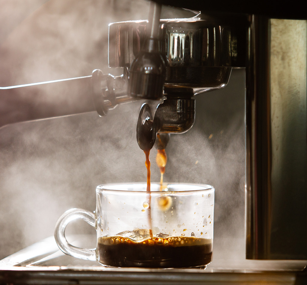 Brewing espresso coffee using a high pressured espresso machine.