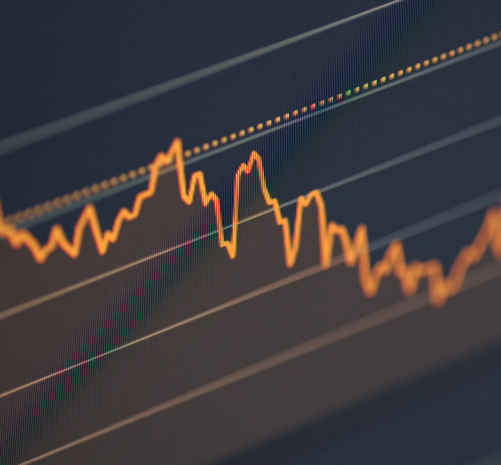 Stock market chart on LCD screen. Selective focus.