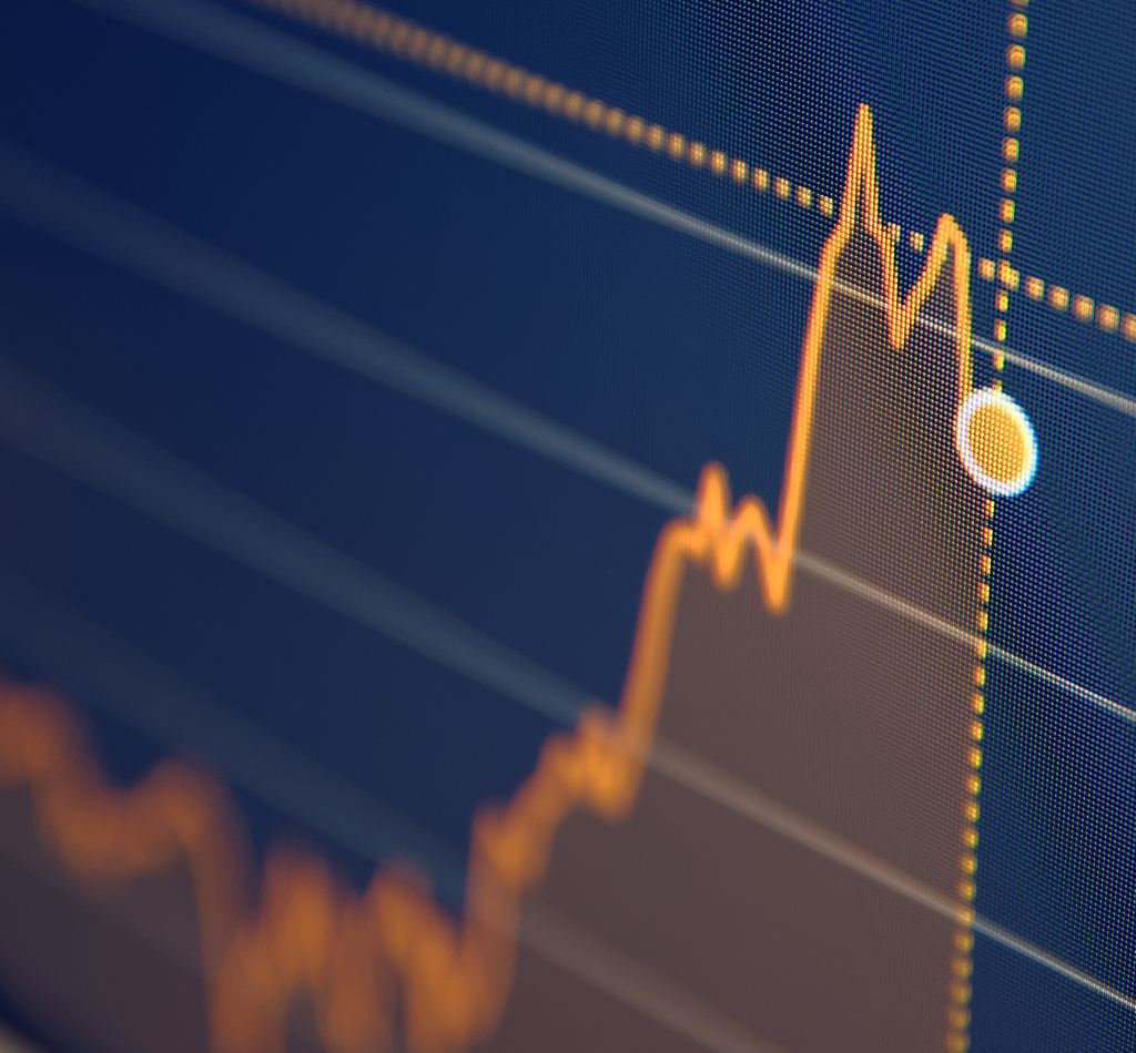 Stock market chart on LCD screen. Selective focus.