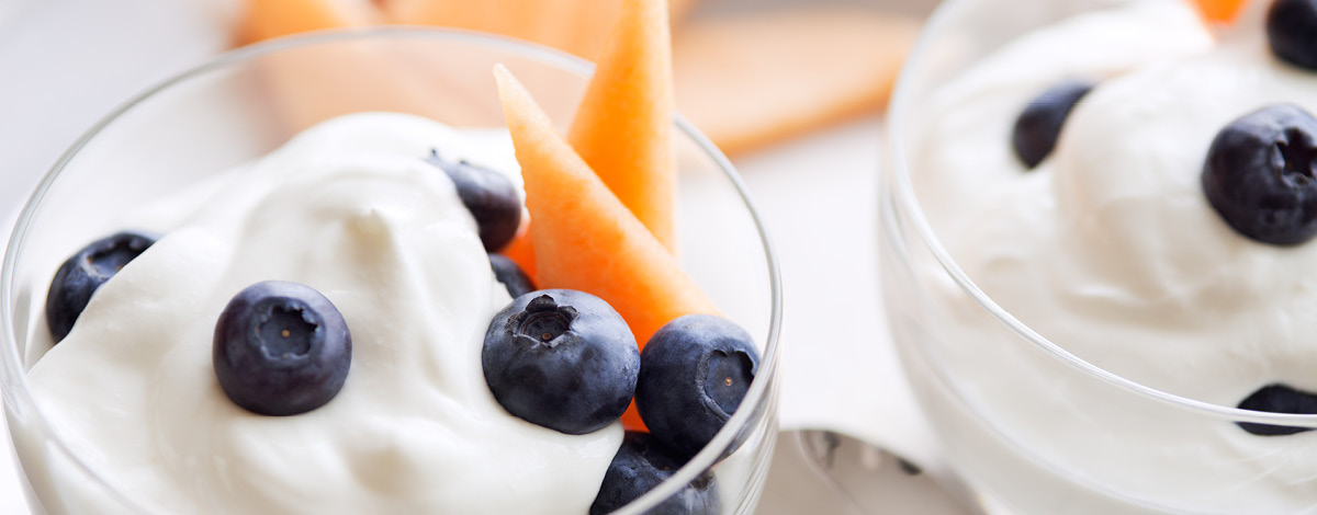 Greek yogurt, blueberries and cantaloupe.