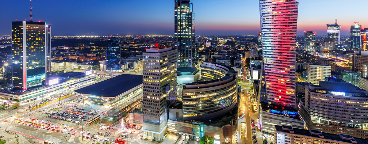 Downtown Warsaw skyline at night.