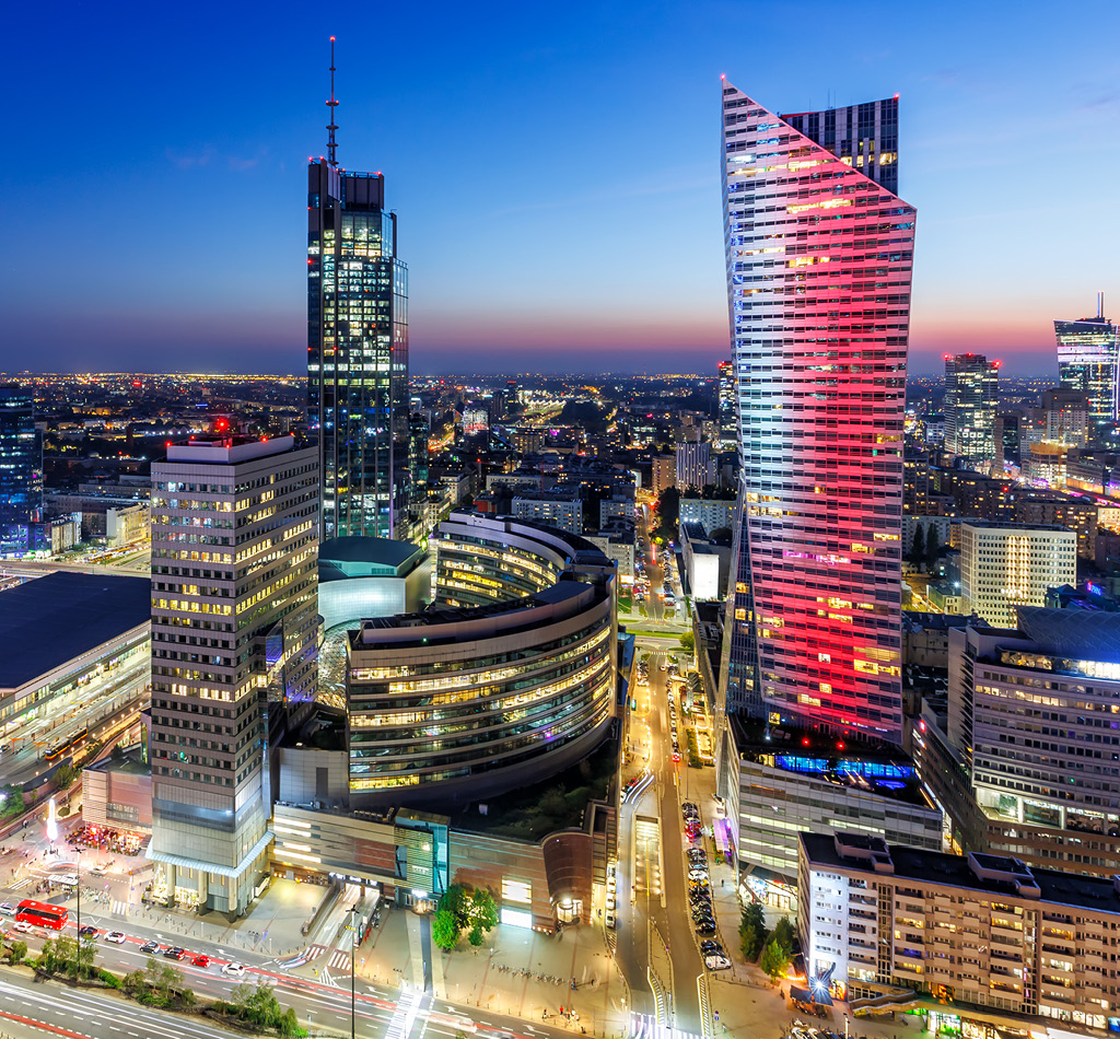Downtown Warsaw skyline at night.